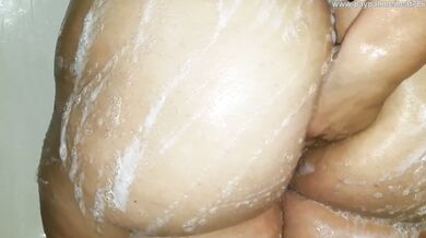 Yong Latina taking a shower, nice soapy ass, I hope she drops the soap.