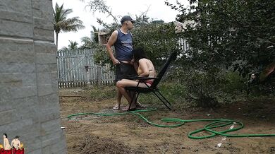 My wife teasing me in front yard while I'm working