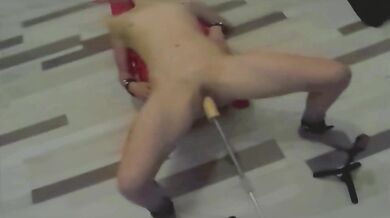 Submissive student slave is fucked by the fucking machine and squirts all over her