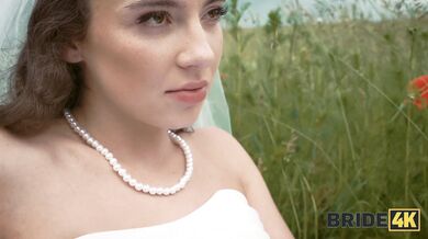 BRIDE4K. Pretty brunette bride fucks a horny shepherd in a summer field