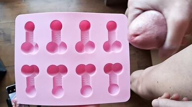 The slave masturbates and the mistress makes an ice cube with his cum for him to drink