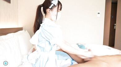 Japanese girl gives a guy a hand job cosplayed as a maid