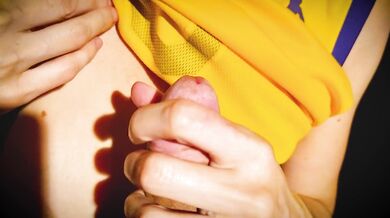 Basketball player gives coach a blowjob in the bathroom at the back of the gym.